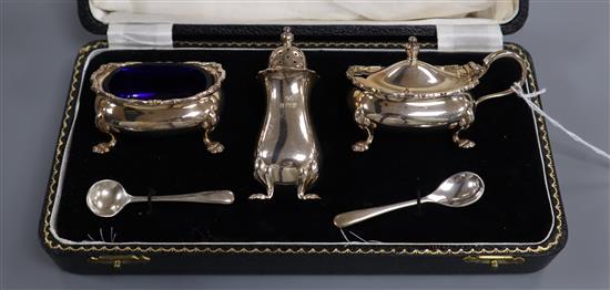 A cased silver three piece condiment set, Birmingham, 1960.